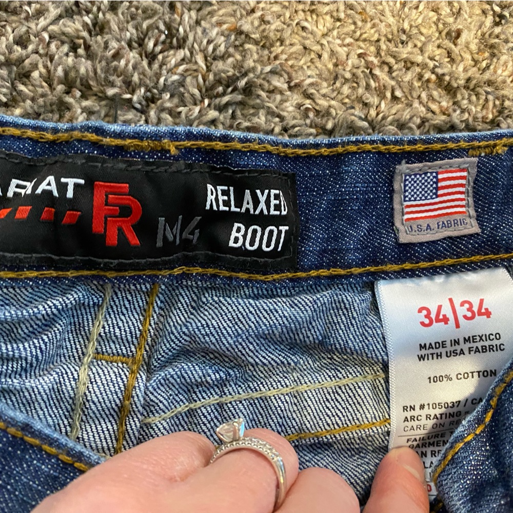 Two pairs of Ariat Fire Resistant pants.